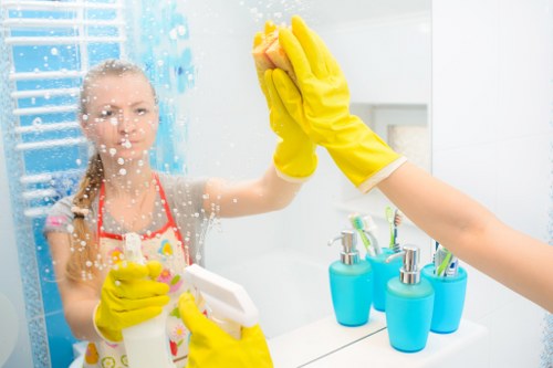 Local Brompton oven cleaner working in a compact apartment kitchen